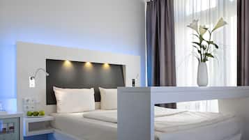 Ropa de cama de alta calidad y minibar