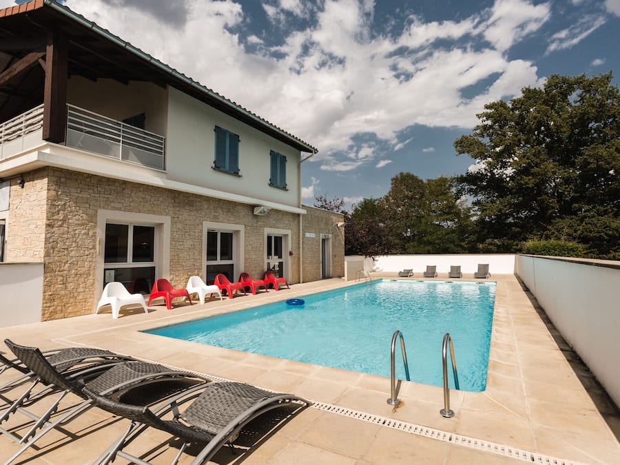 Seasonal outdoor pool, open 10:00 AM to 7:00 PM, pool umbrellas