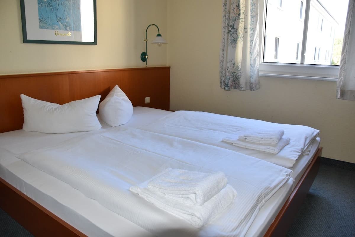 1 bedroom, desk, iron/ironing board, bed sheets