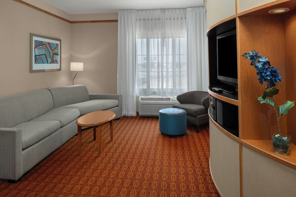 Junior suite, 1 slaapkamer | Een bureau, een laptopwerkplek, verduisterende gordijnen