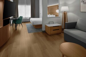 Suíte executiva, 1 cama King e sofá-cama | Escrivaninha, espaço de trabalho para notebook, cortinas blackout