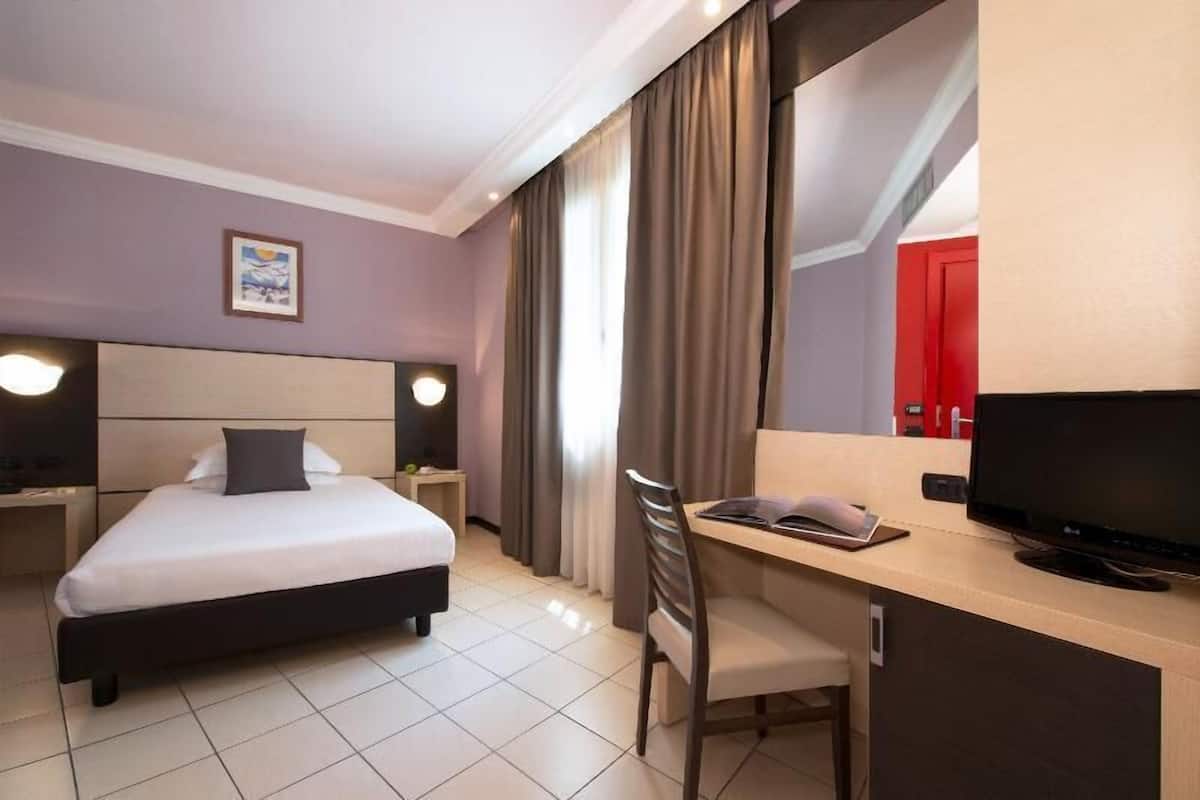 Down duvets, minibar, in-room safe, desk