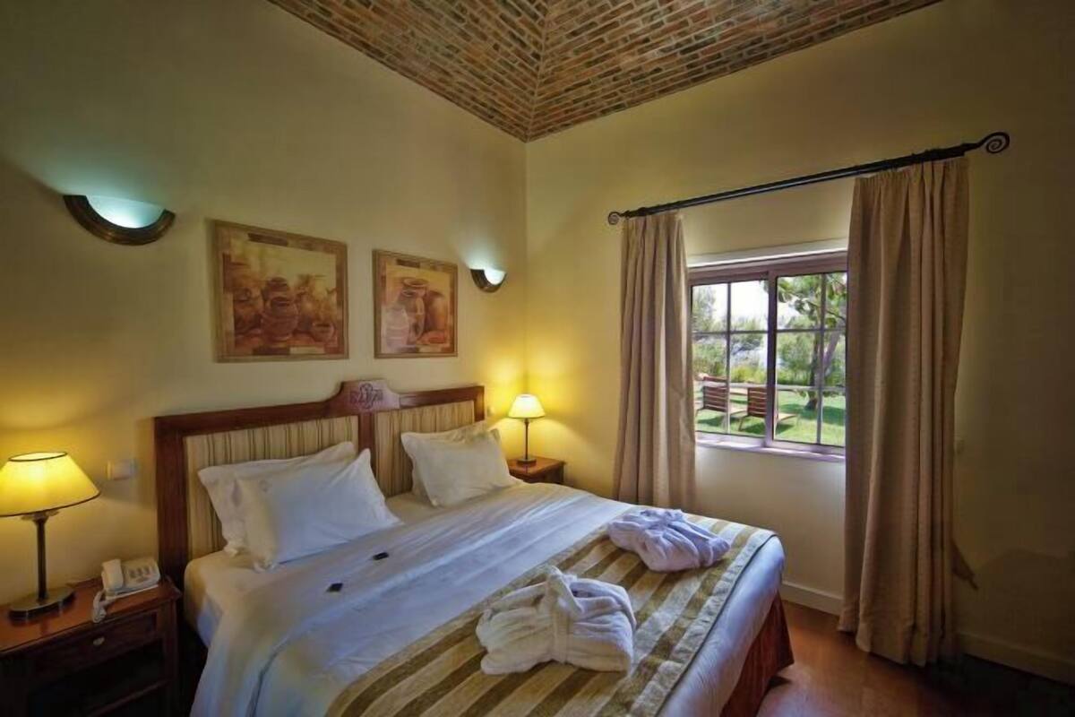 In-room safe, blackout drapes, WiFi (free), bed sheets