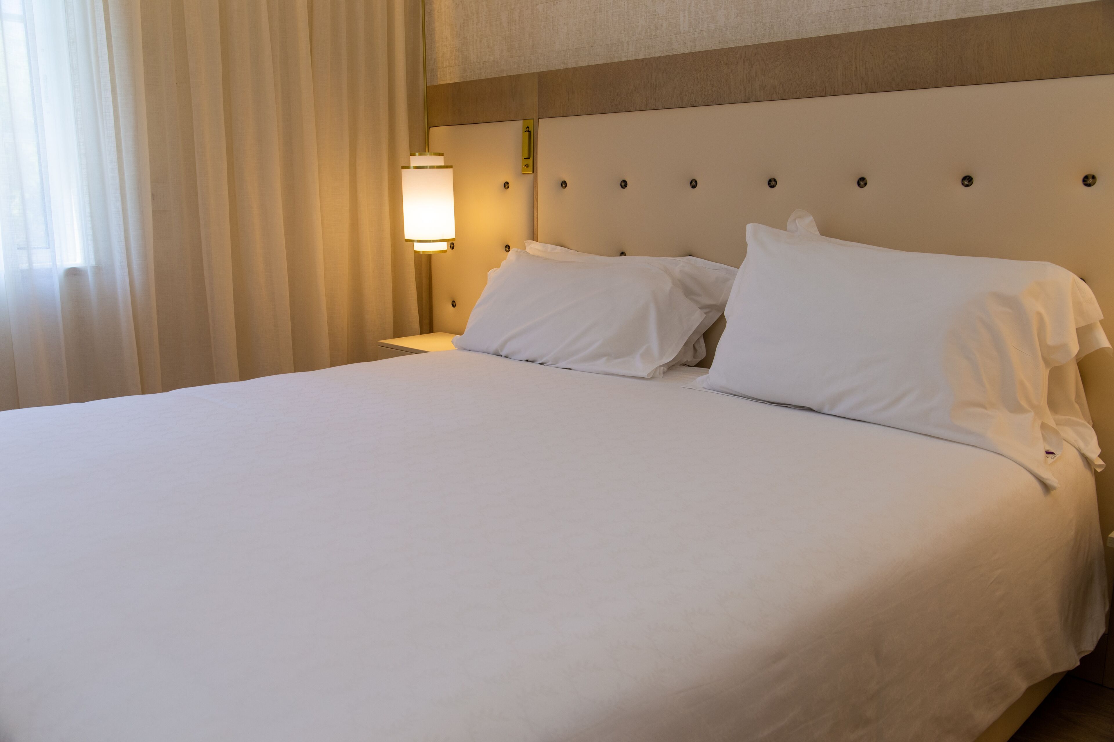 premium suite, garden view | 2 bedrooms, in-room safe, blackout curtains, free wifi