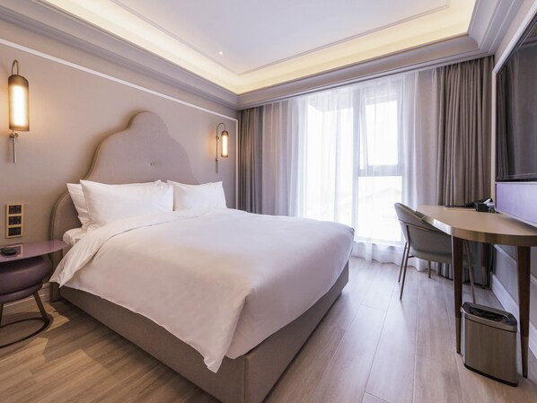 Deluxe-Zimmer, 1 King-Bett | Minibar, Zimmersafe, Schreibtisch, kostenloses WLAN