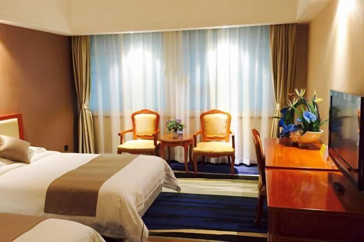 Premium bedding, down duvets, in-room safe, desk