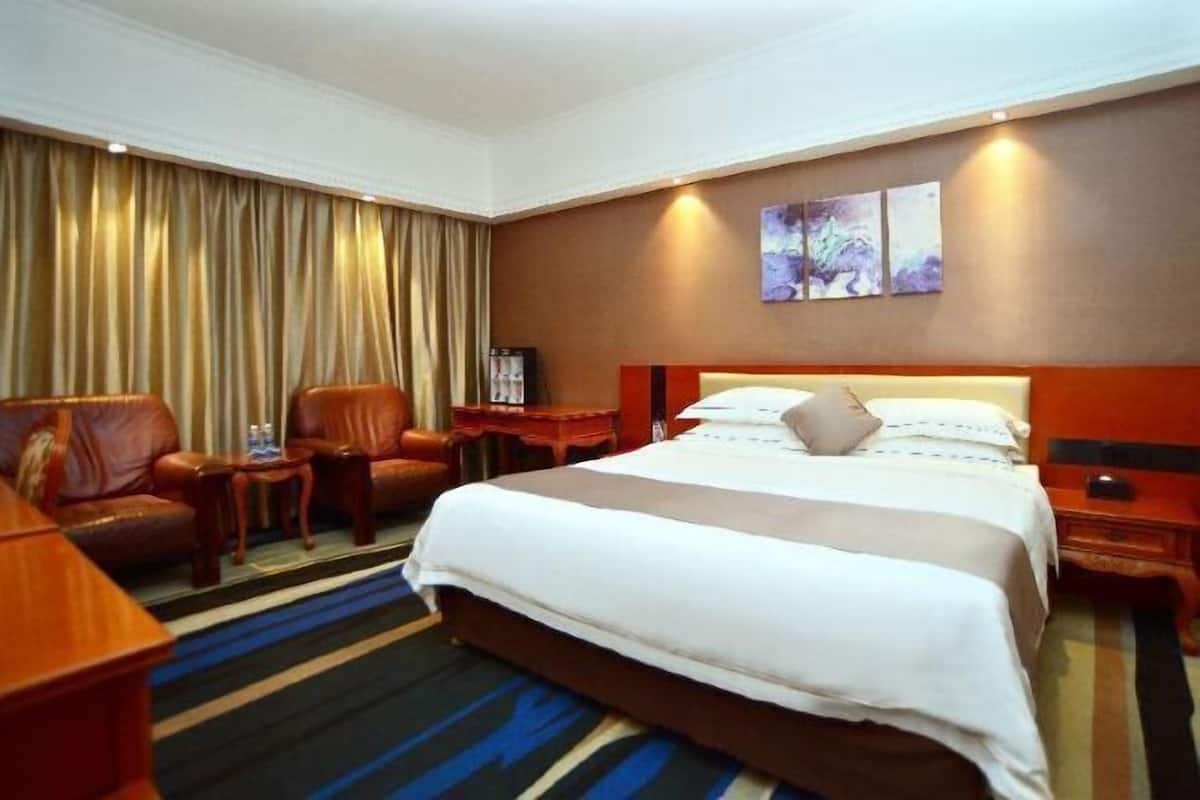 Premium bedding, down duvets, in-room safe, desk