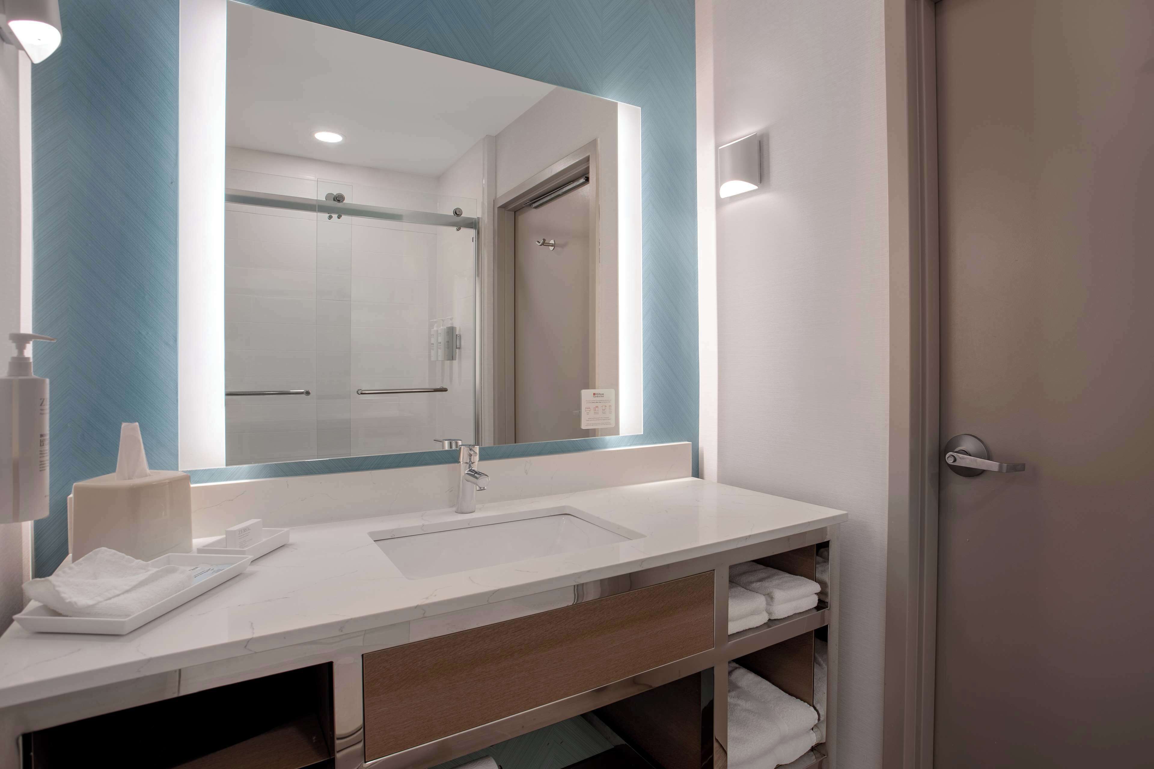 suite, 1 king bed | bathroom | hair dryer, towels