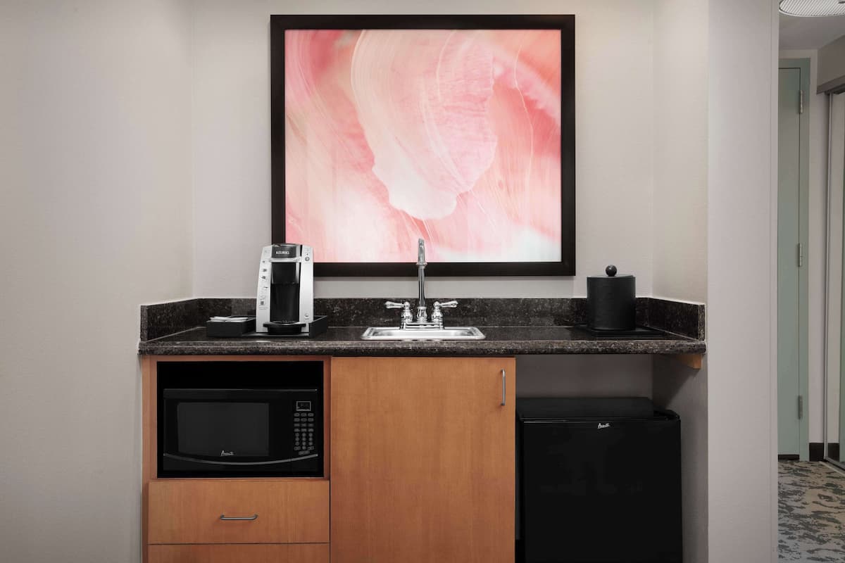 desk, laptop workspace, blackout curtains, iron/ironing board