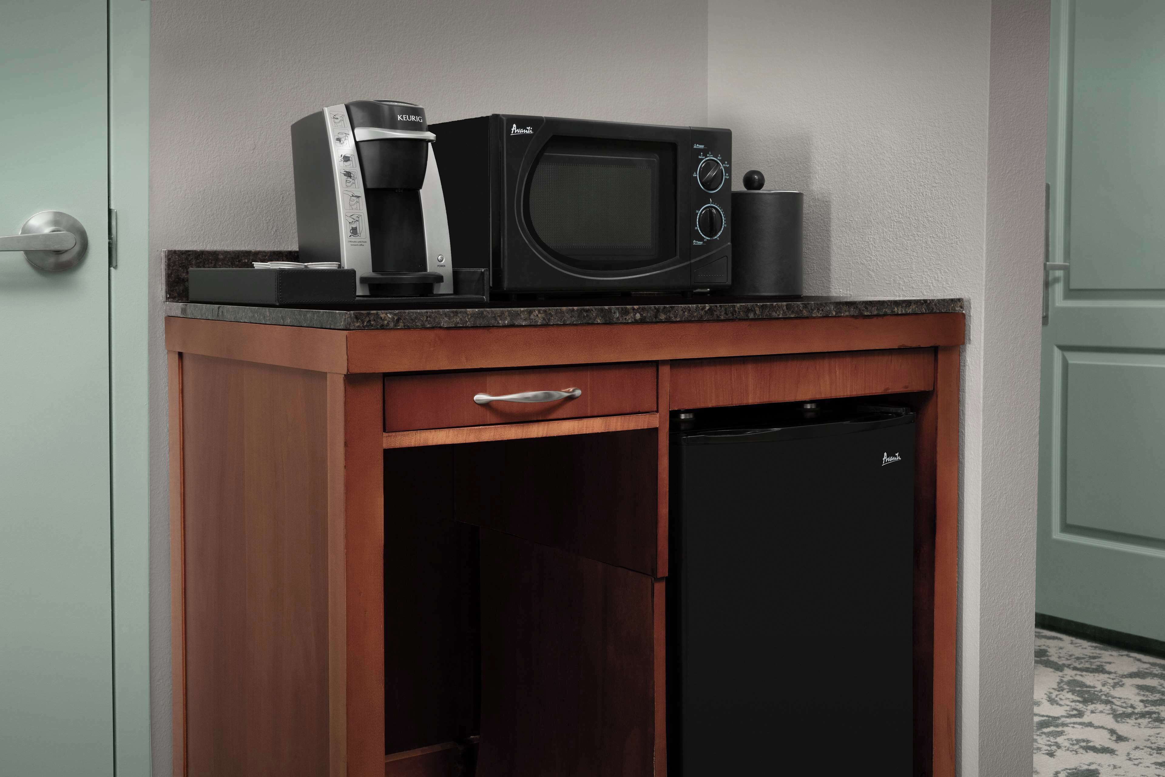 desk, laptop workspace, blackout curtains, iron/ironing board