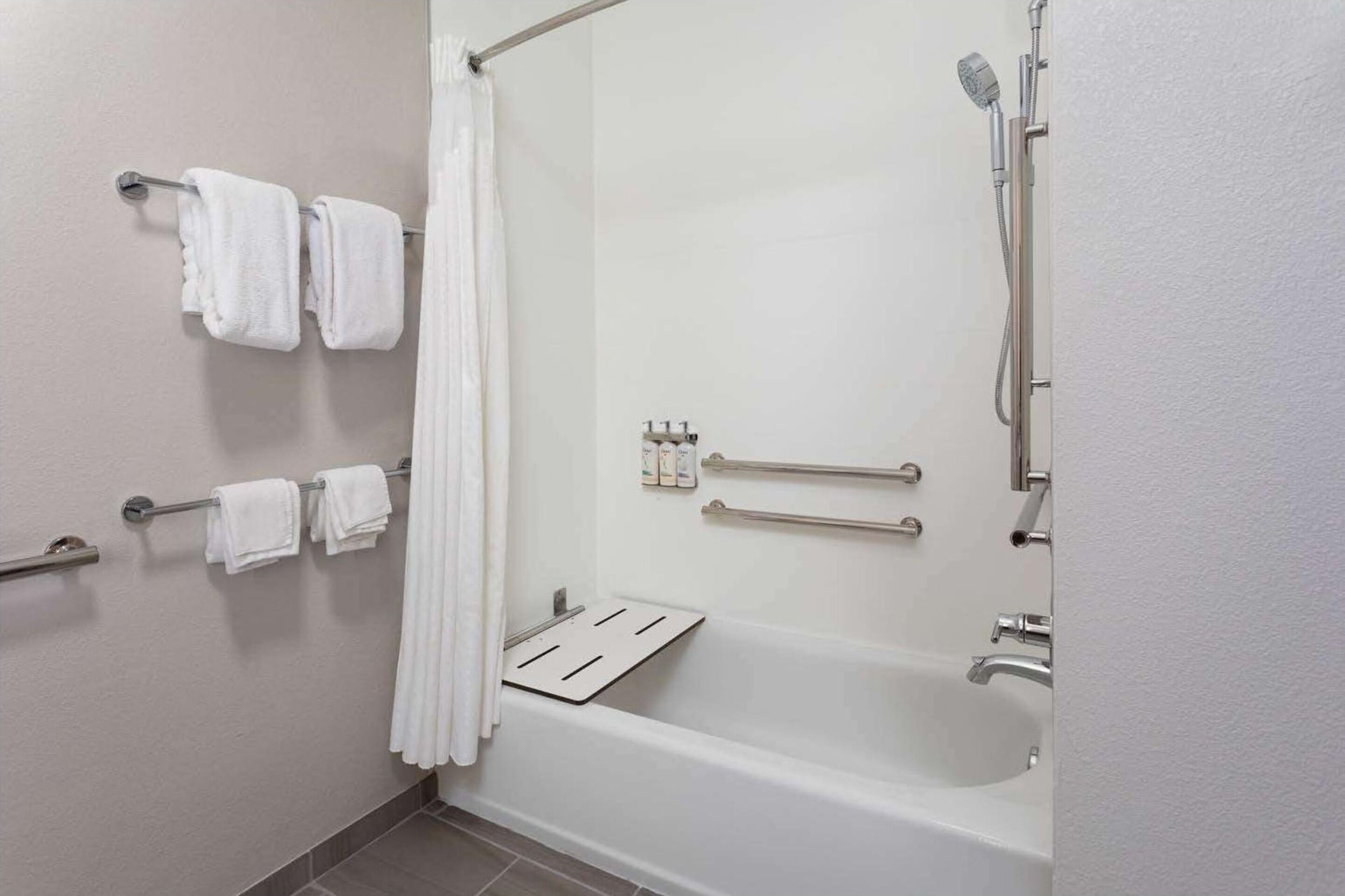 combined shower/bathtub, free toiletries, hair dryer, towels