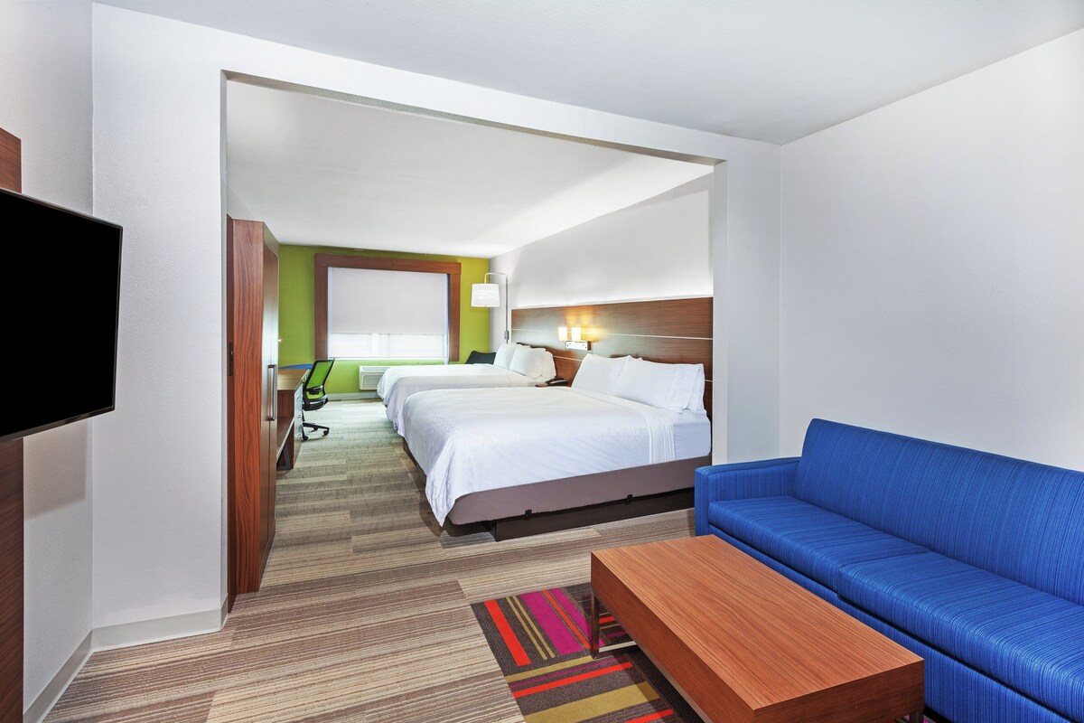 Suite, 2 Double Beds | In-room safe, desk, iron/ironing board, free cots/infant beds