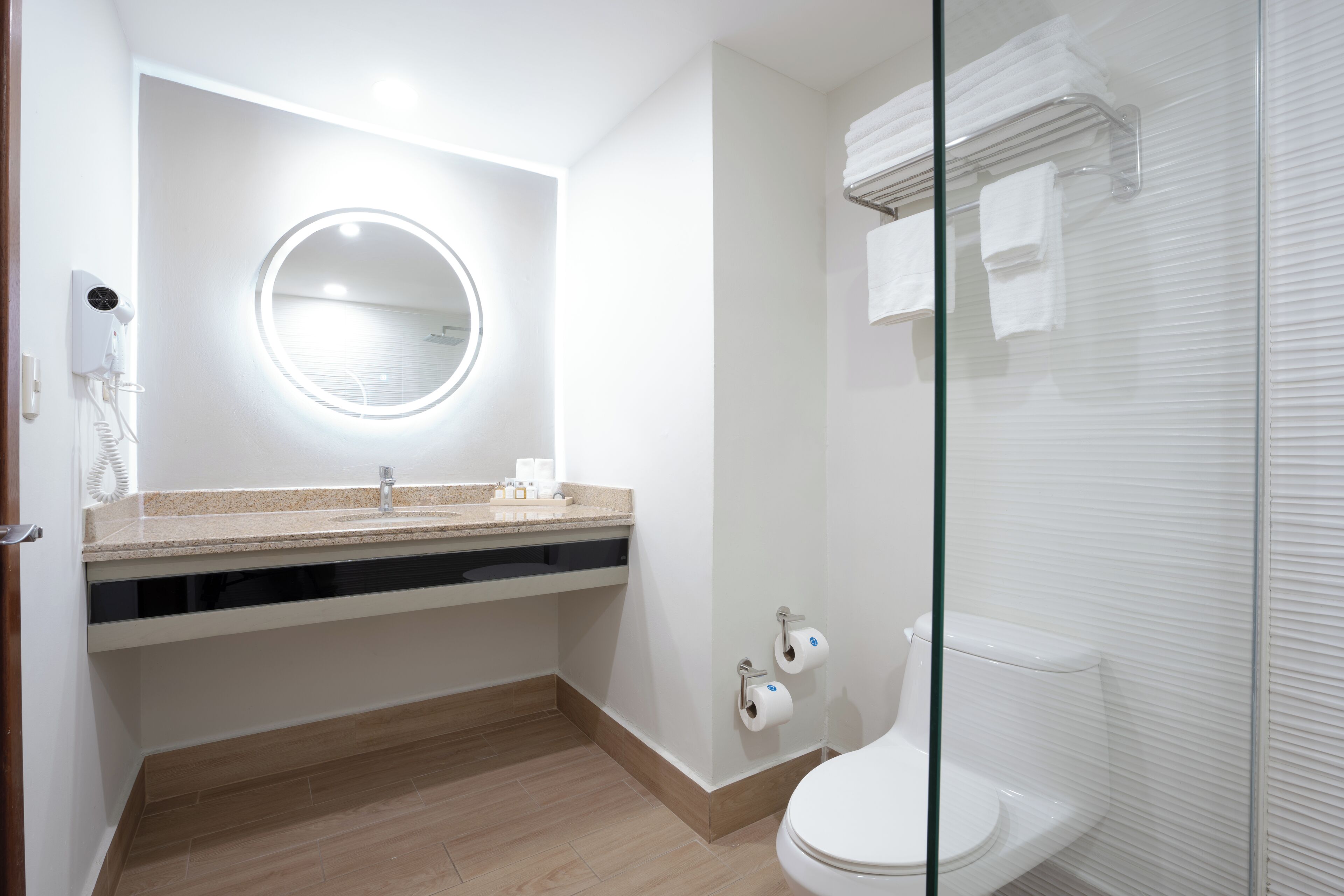 combined shower/bathtub, deep-soaking bathtub, hair dryer, towels