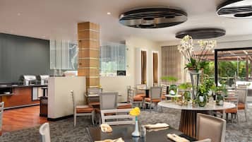 Breakfast, lunch, dinner served; international cuisine