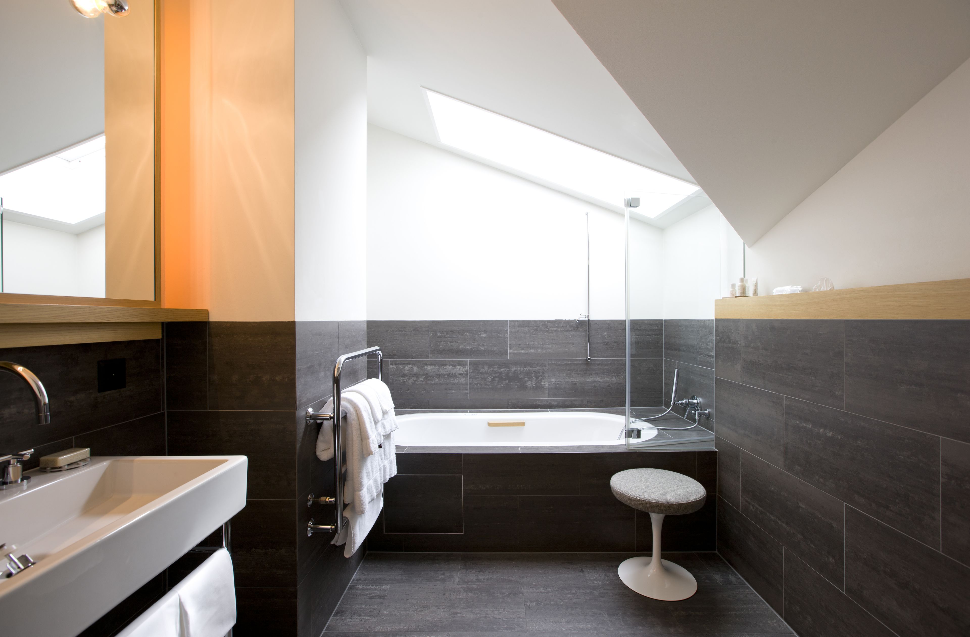 deluxe double room, 1 king bed | bathroom | hair dryer, bathrobes, slippers, towels