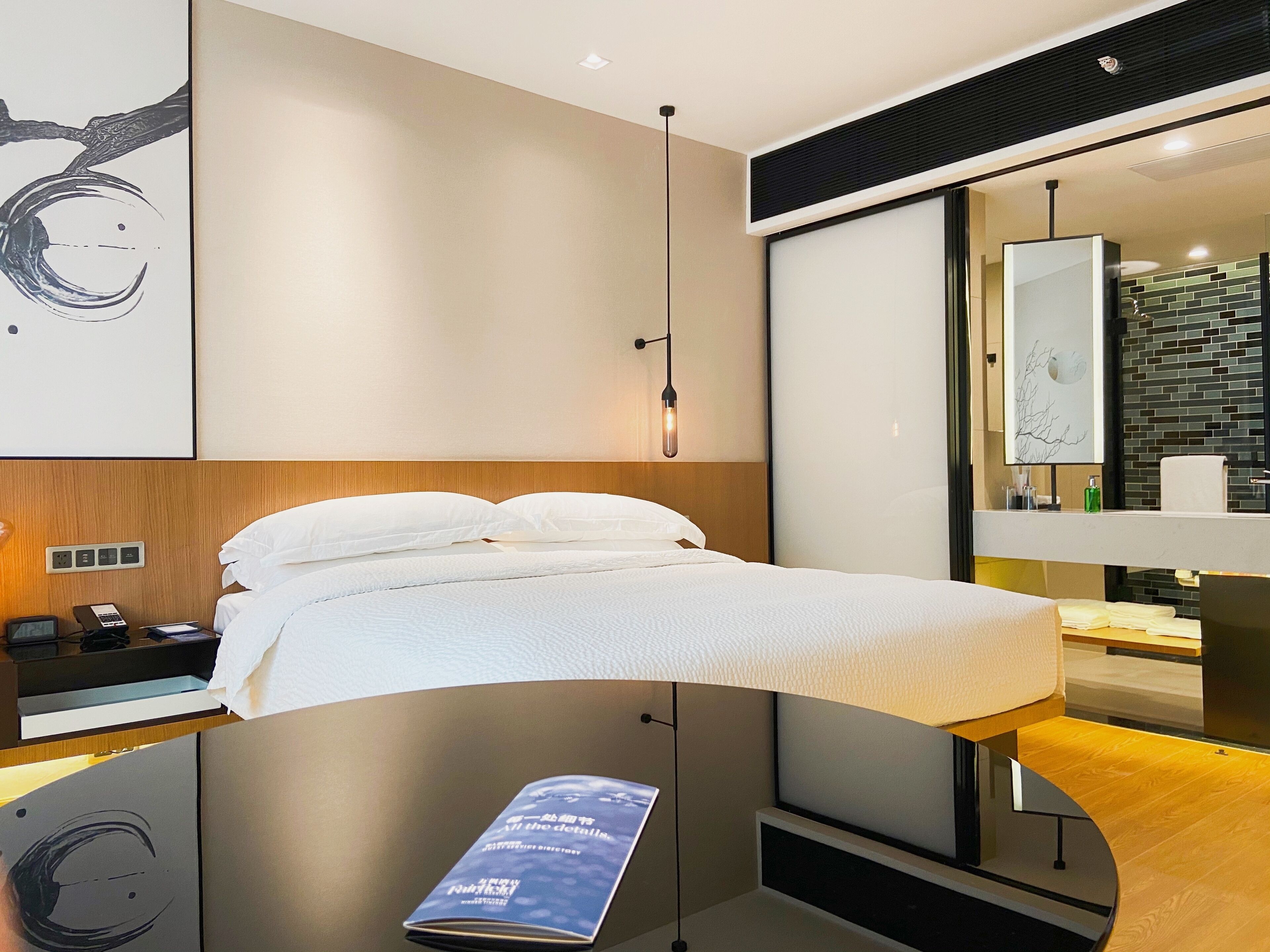 deluxe room, 1 king bed, city view | in-room safe, desk, laptop workspace, blackout curtains