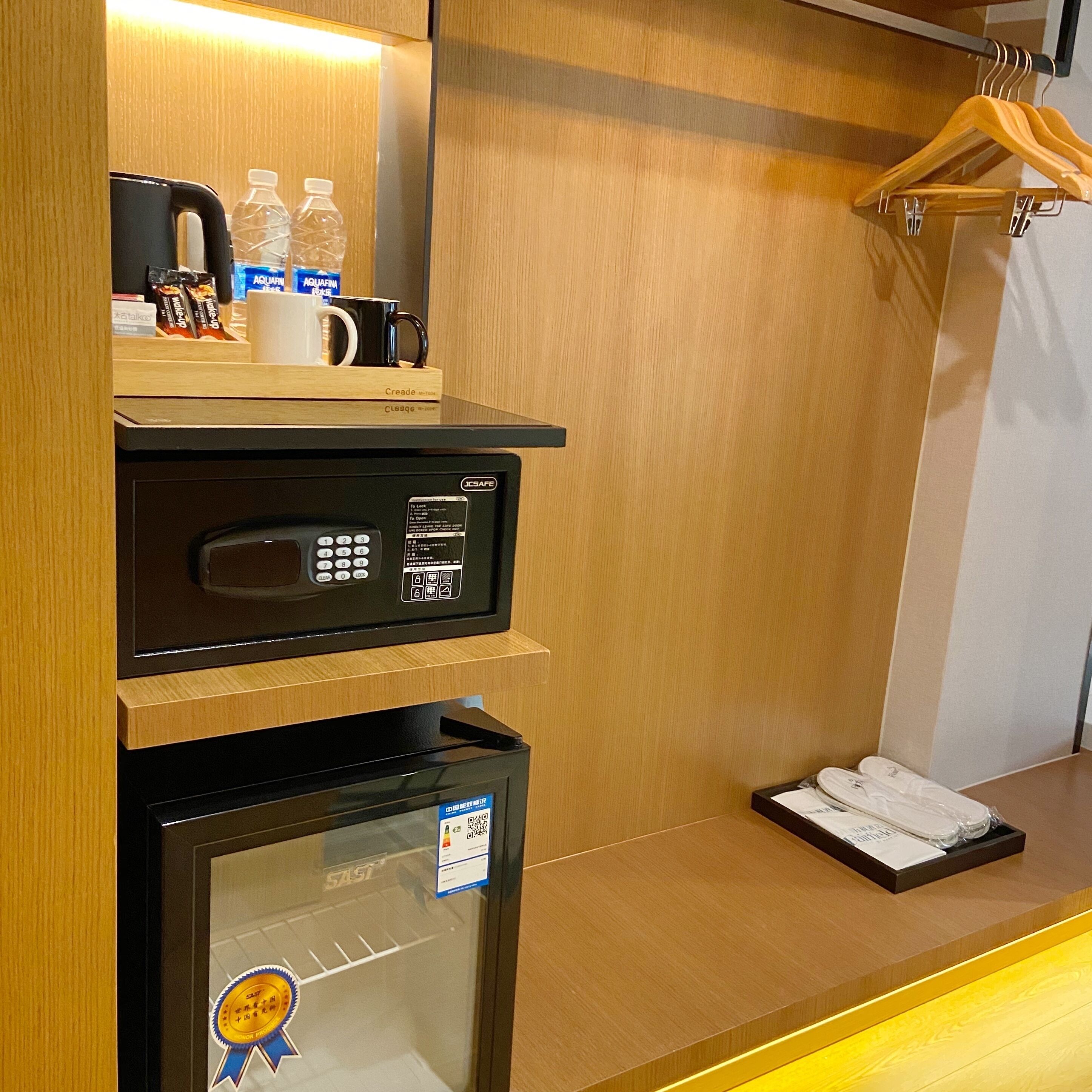 deluxe room, 1 king bed, city view | in-room safe, desk, laptop workspace, blackout curtains