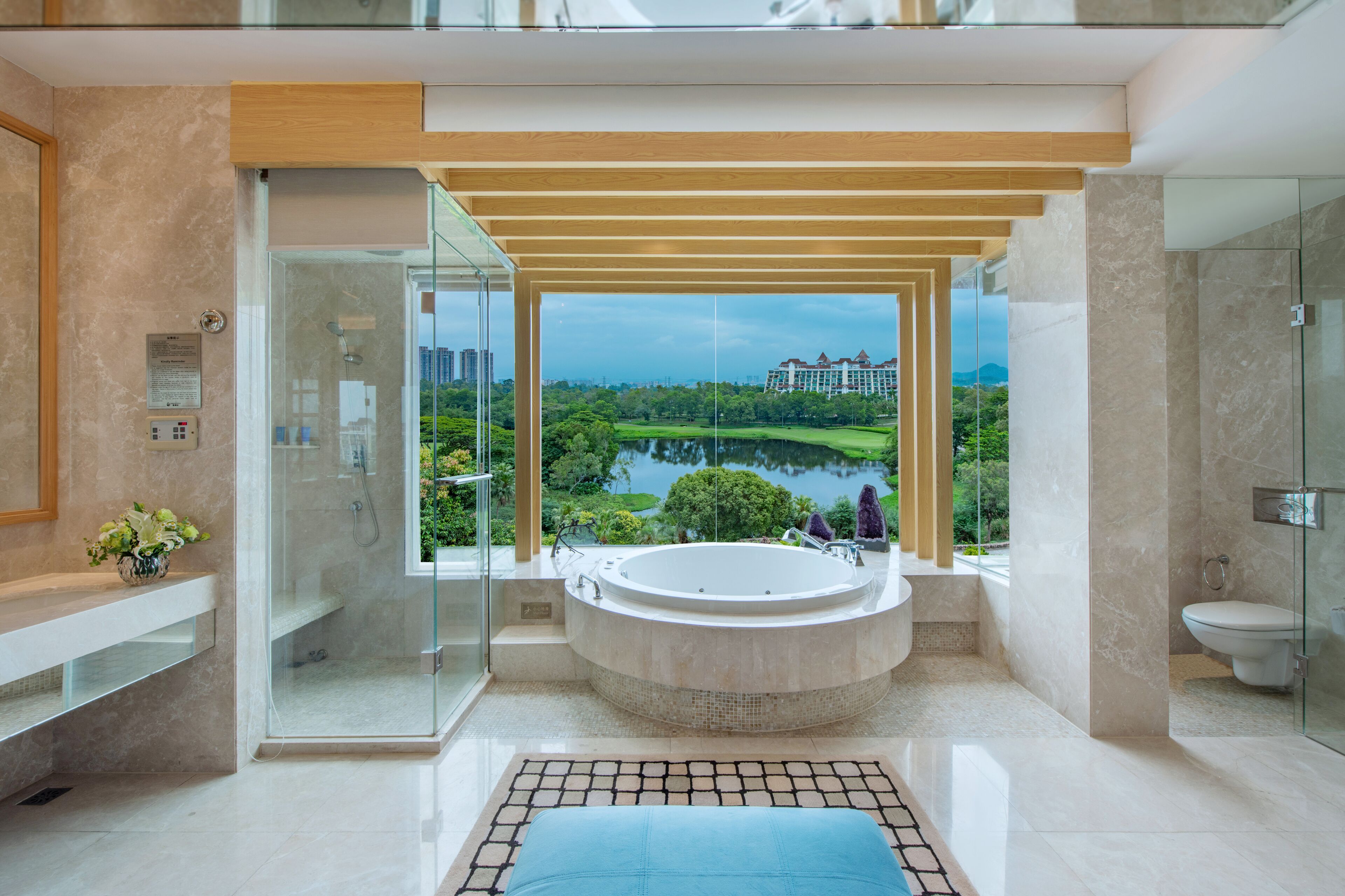 grande premiere suite | bathroom | separate bathtub and shower, rainfall showerhead, hair dryer, bathrobes