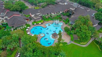 Outdoor pool, open 10:00 AM to 7:00 PM, pool umbrellas, pool loungers