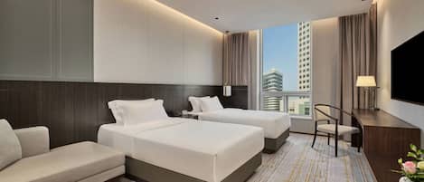 Habitación empresarial doble, varias camas | Edredón, cortinas blackout, wifi gratis y ropa de cama