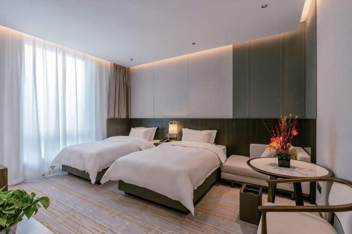 Edredón, cortinas blackout, wifi gratis y ropa de cama