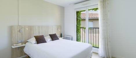 Appartement, 2 slaapkamers | 1 slaapkamer, een bureau, geluiddichte muren