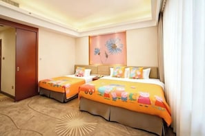 A hotel room with two beds, a large window with curtains, a door, and a wall with a floral painting. - Celeste Palace Hotel (Jiangmen)