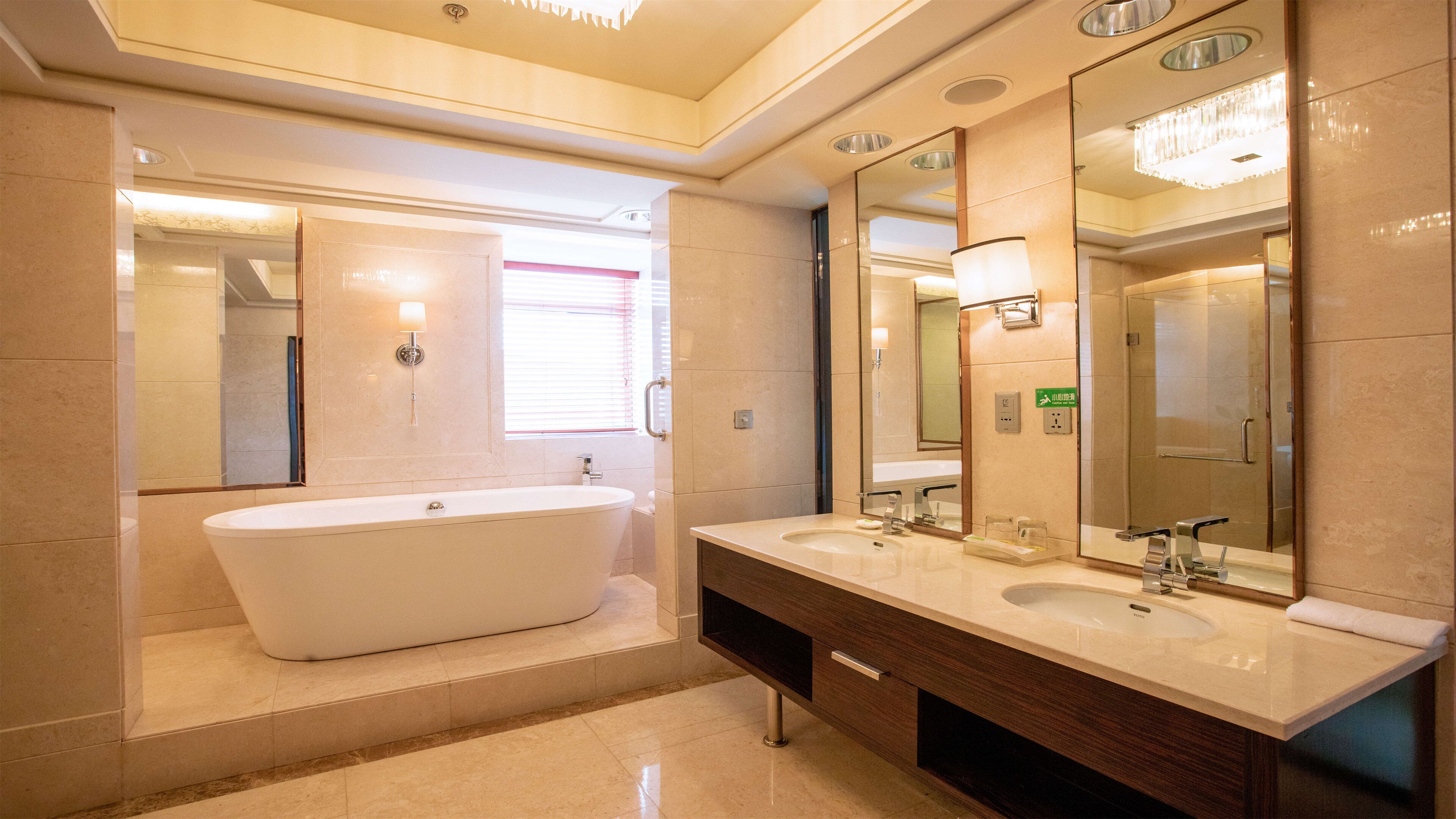 presidential suite | bathroom | bathtub, free toiletries, bathrobes, towels
