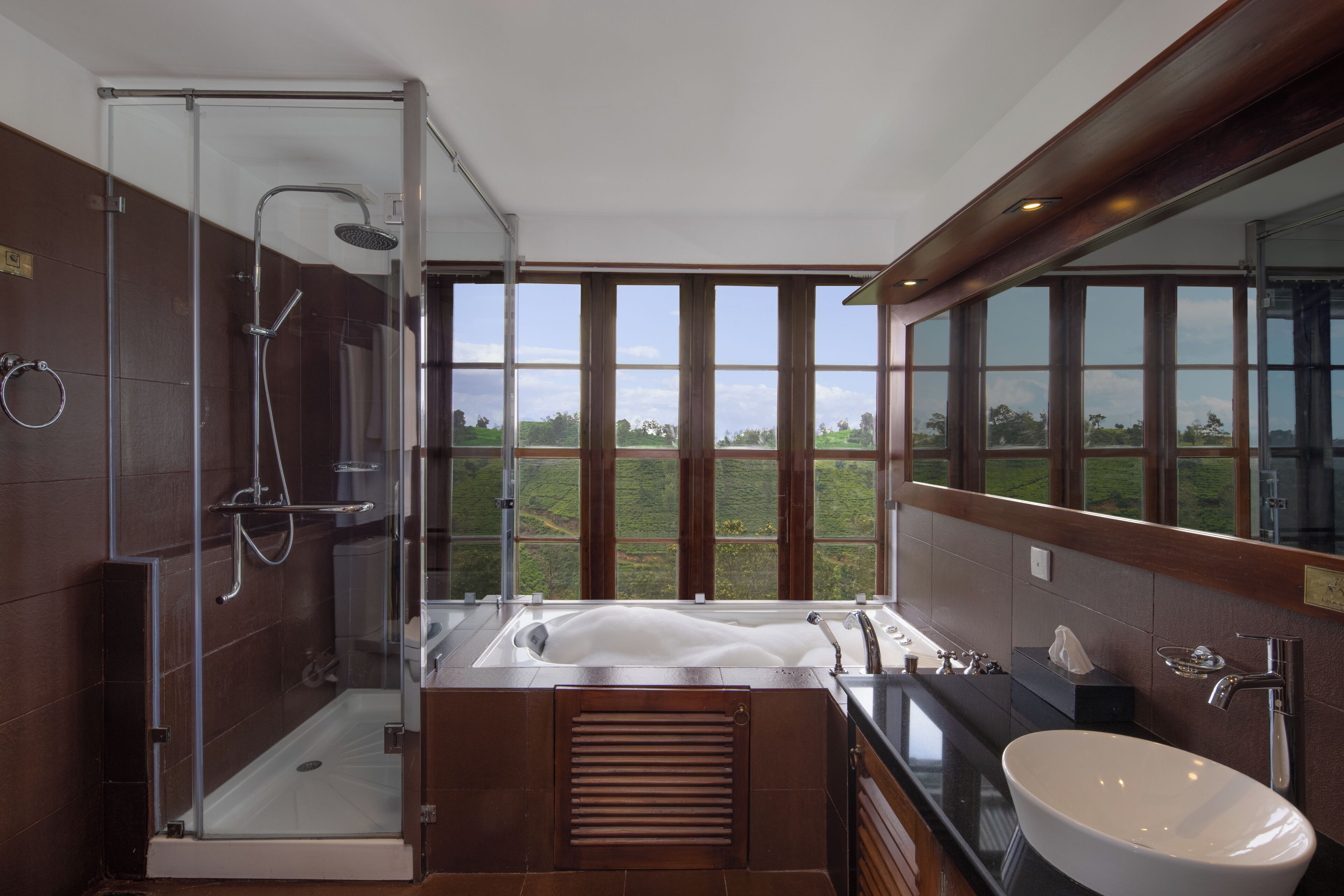 flowerdew suite | bathroom | rainfall showerhead, free toiletries, hair dryer, slippers