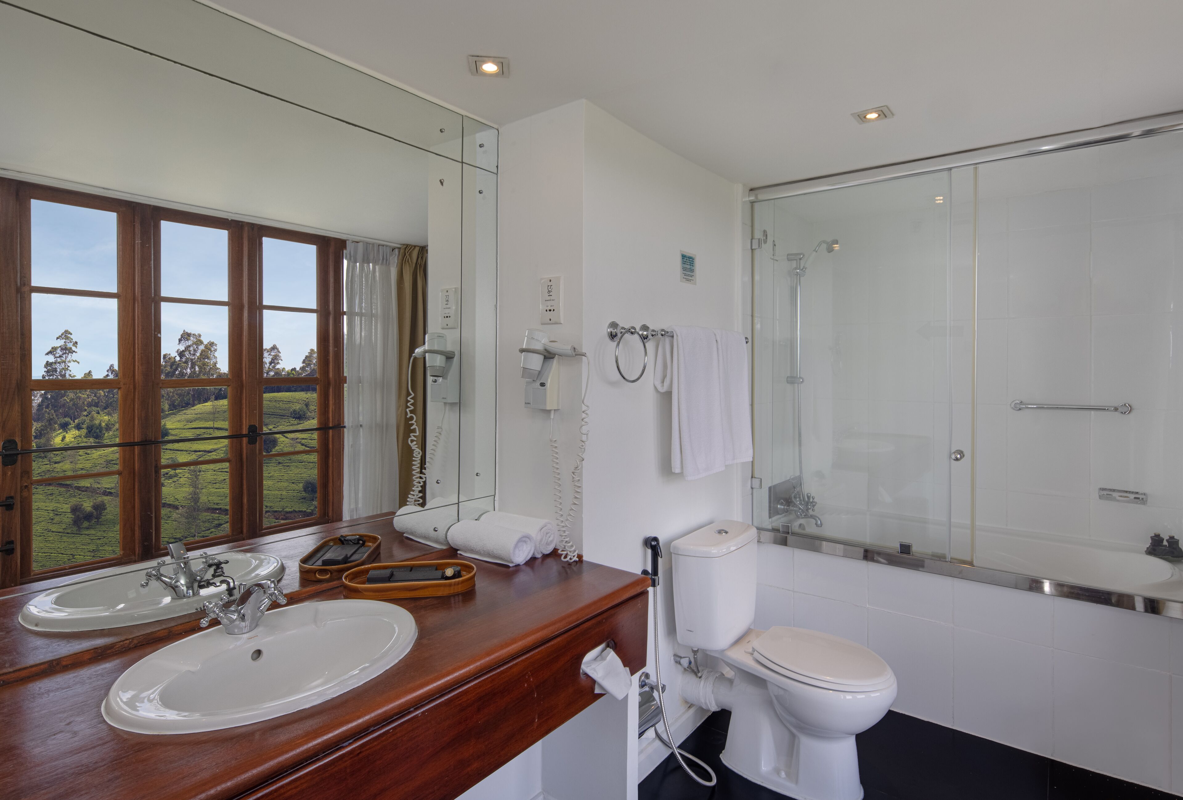 premium room | bathroom | rainfall showerhead, free toiletries, hair dryer, slippers