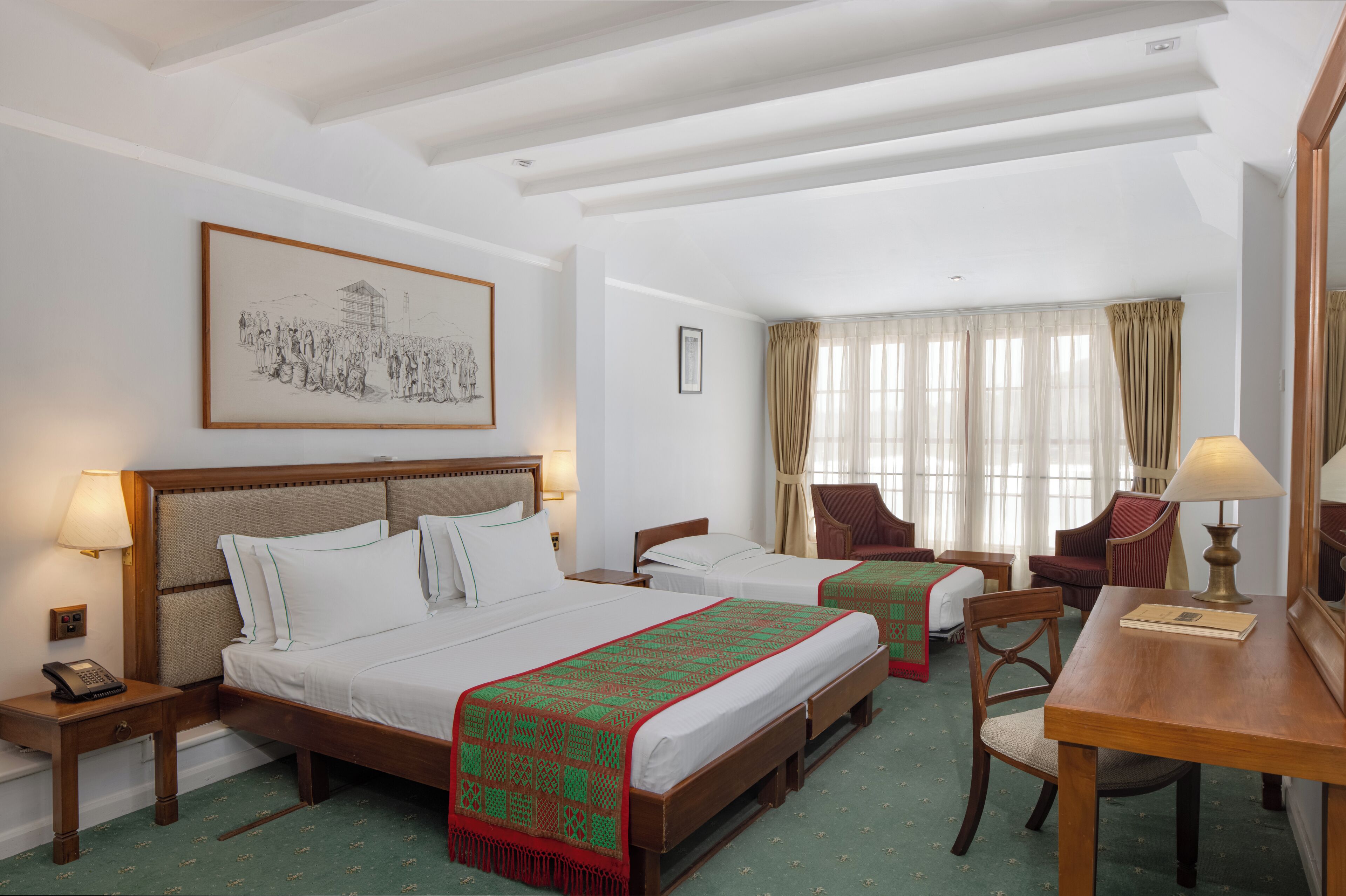 Habitación triple superior | Camas con efecto memoria, minibar y caja de seguridad en la habitación 