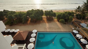 2 outdoor pools, open 7 AM to 7 PM, pool umbrellas, sun loungers