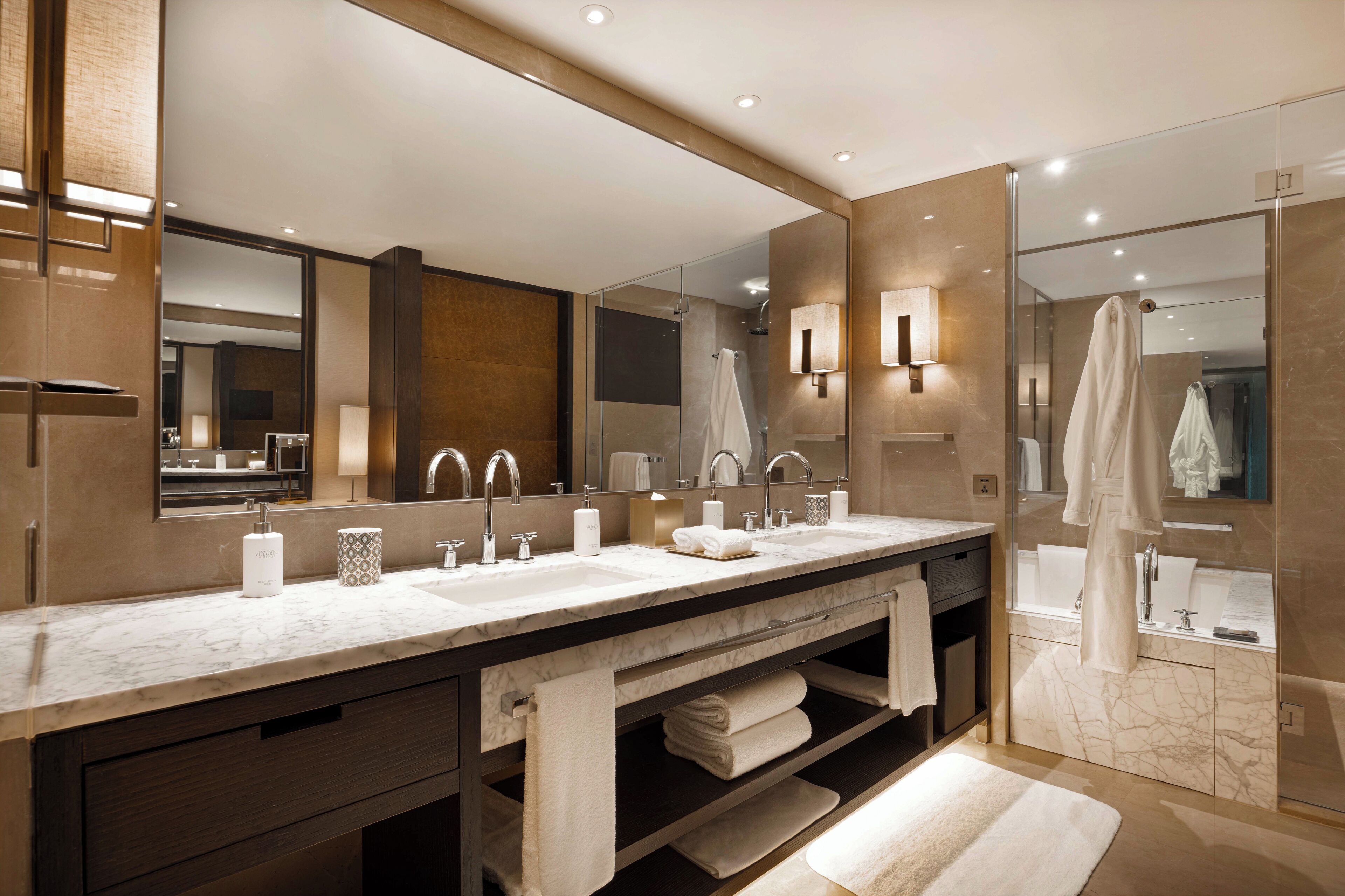 designer toiletries, hair dryer, bathrobes, towels