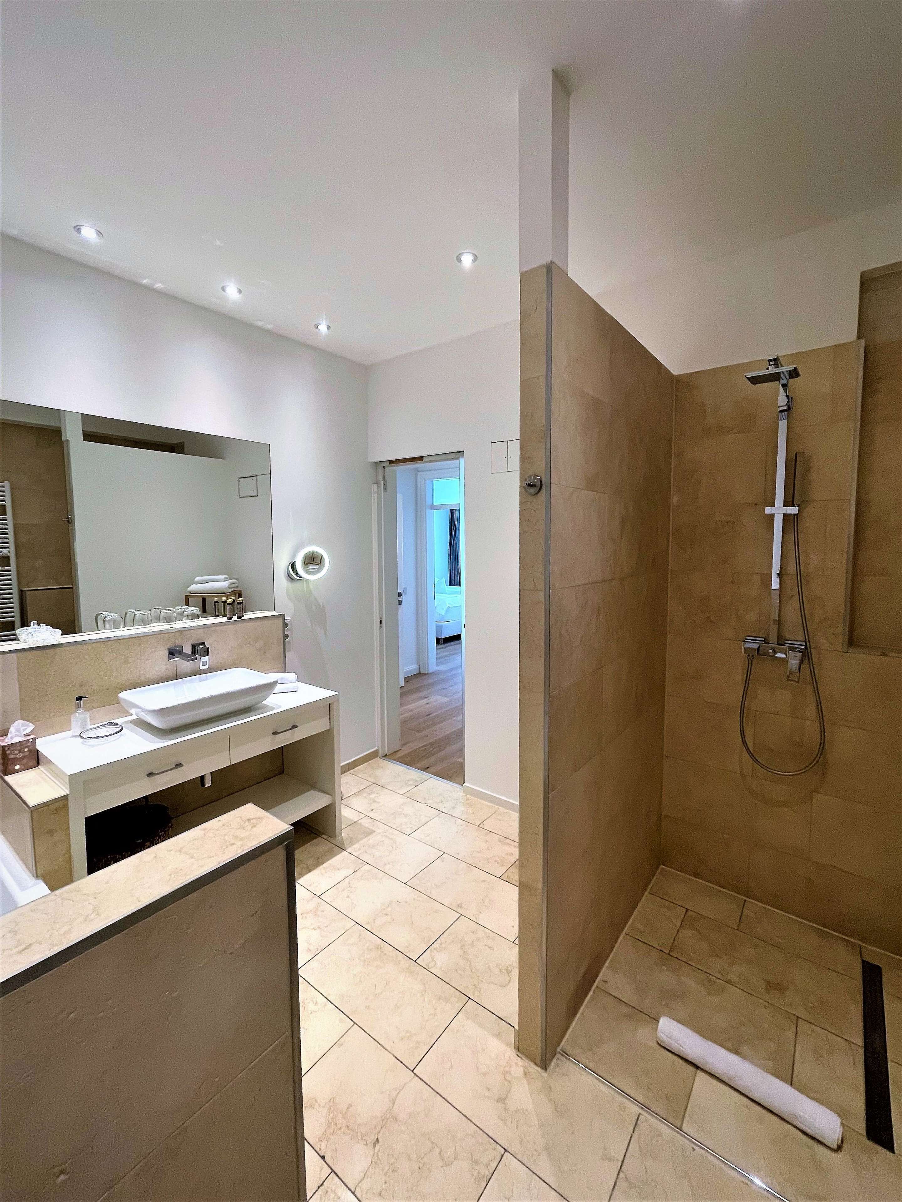 free toiletries, hair dryer, slippers, bidet