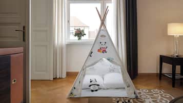 Deluxe Suite, 1 King Bed | Premium bedding, minibar, in-room safe, desk