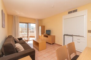 Apartment, 1 Bedroom, Terrace | Living area | Flat-screen TV
