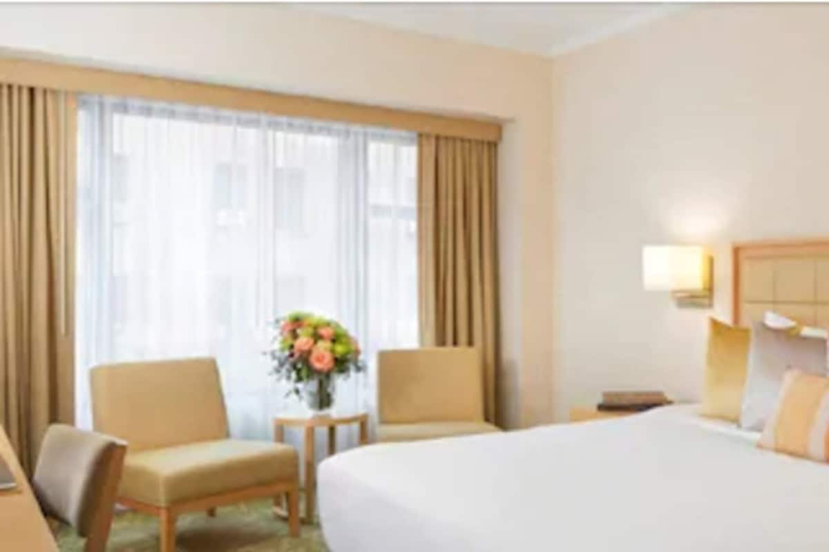 Premium bedding, down comforters, pillowtop beds, in-room safe