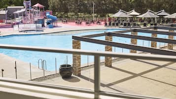 2 outdoor pools, open 7:00 AM to 7:00 PM, pool umbrellas, pool loungers