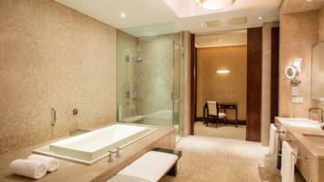 Combined shower/tub, free toiletries, hair dryer, bathrobes