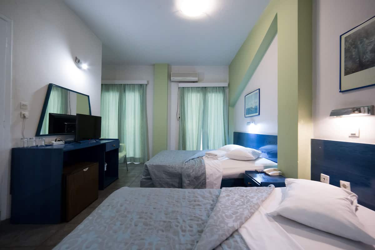 Habitación triple | Sábanas de algodón egipcio y ropa de cama de alta calidad