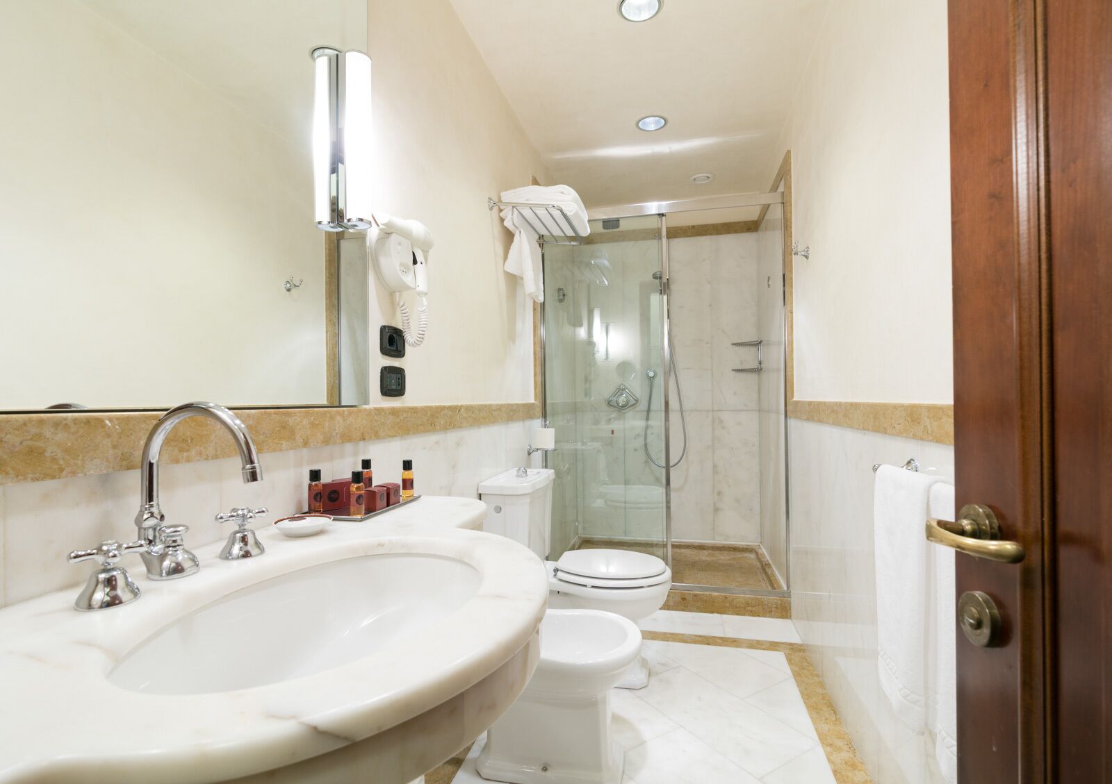deluxe double or twin room | bathroom | hair dryer, bidet, towels