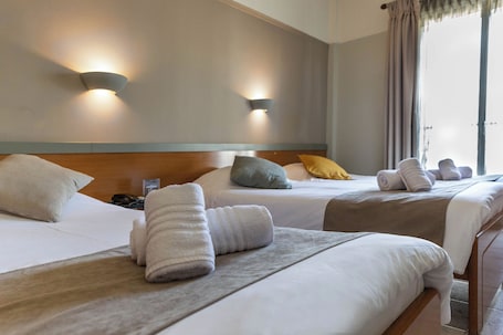 Standard Triple Room, 3 Twin Beds | In-room safe, desk, blackout drapes, iron/ironing board