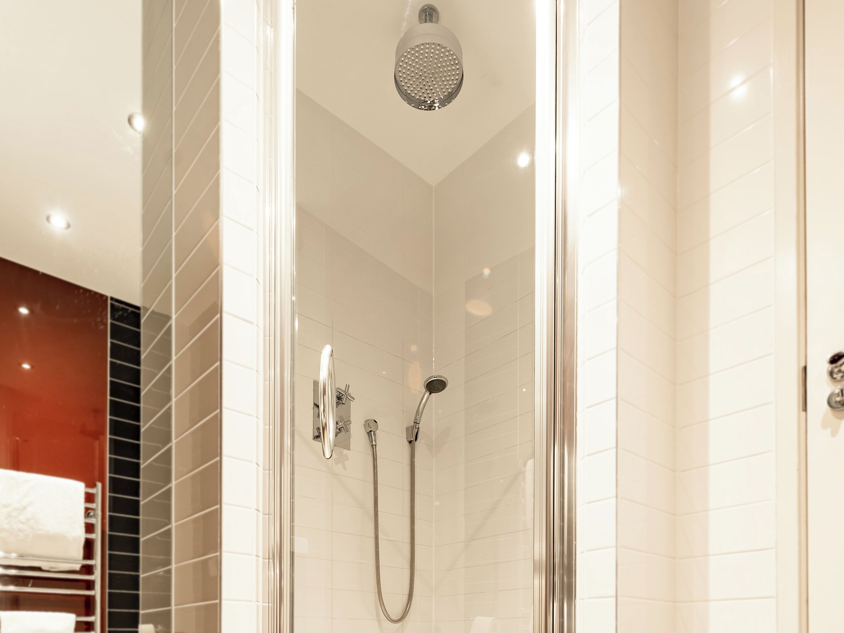 shower, rainfall showerhead, designer toiletries, hair dryer