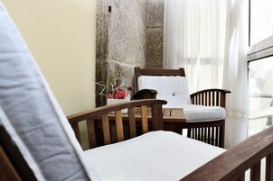 Double or Twin Room | Living area | Flat-screen TV