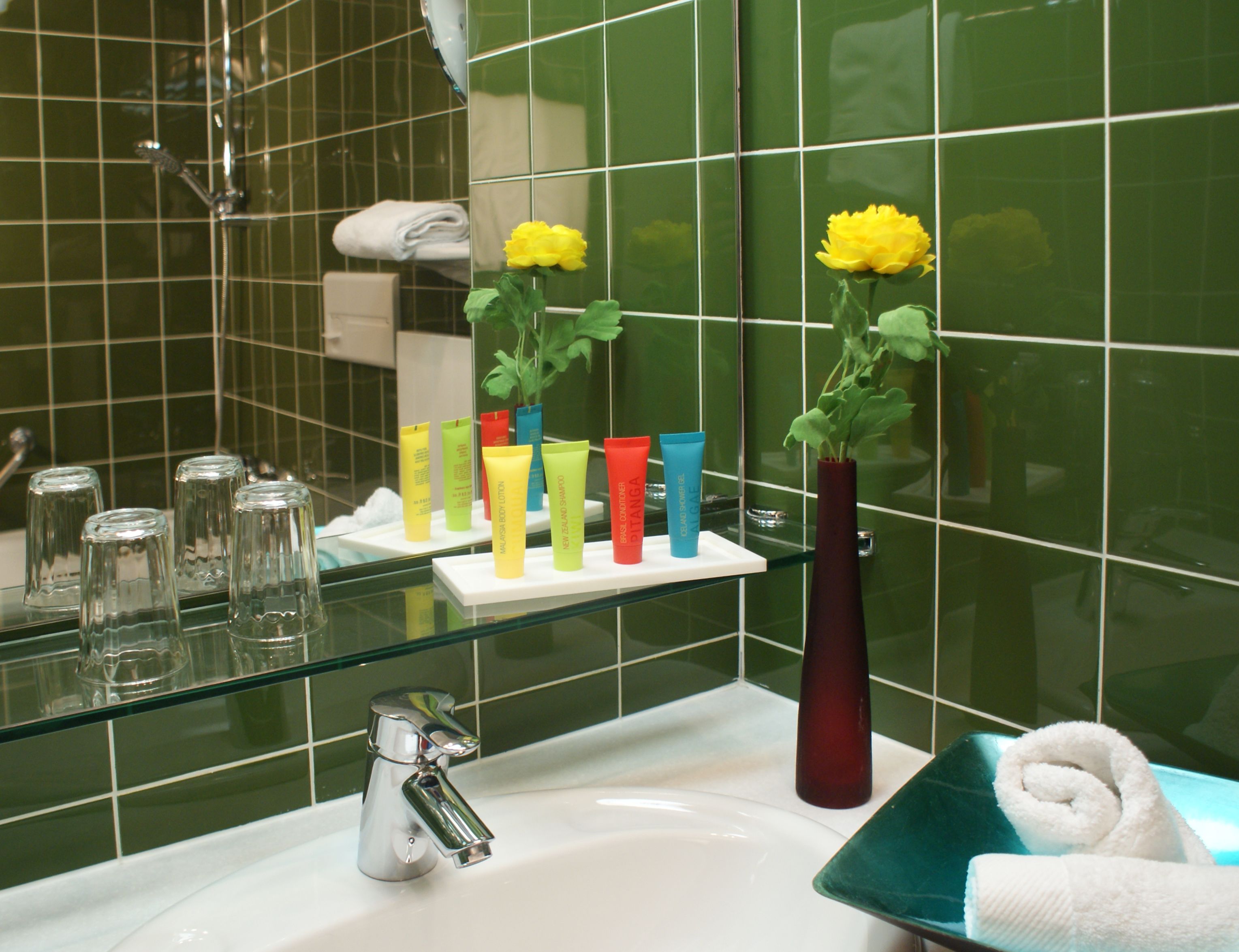 combined shower/bathtub, free toiletries, hair dryer, slippers