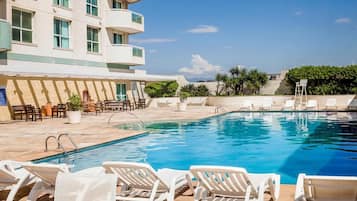 Outdoor pool, pool umbrellas, pool loungers