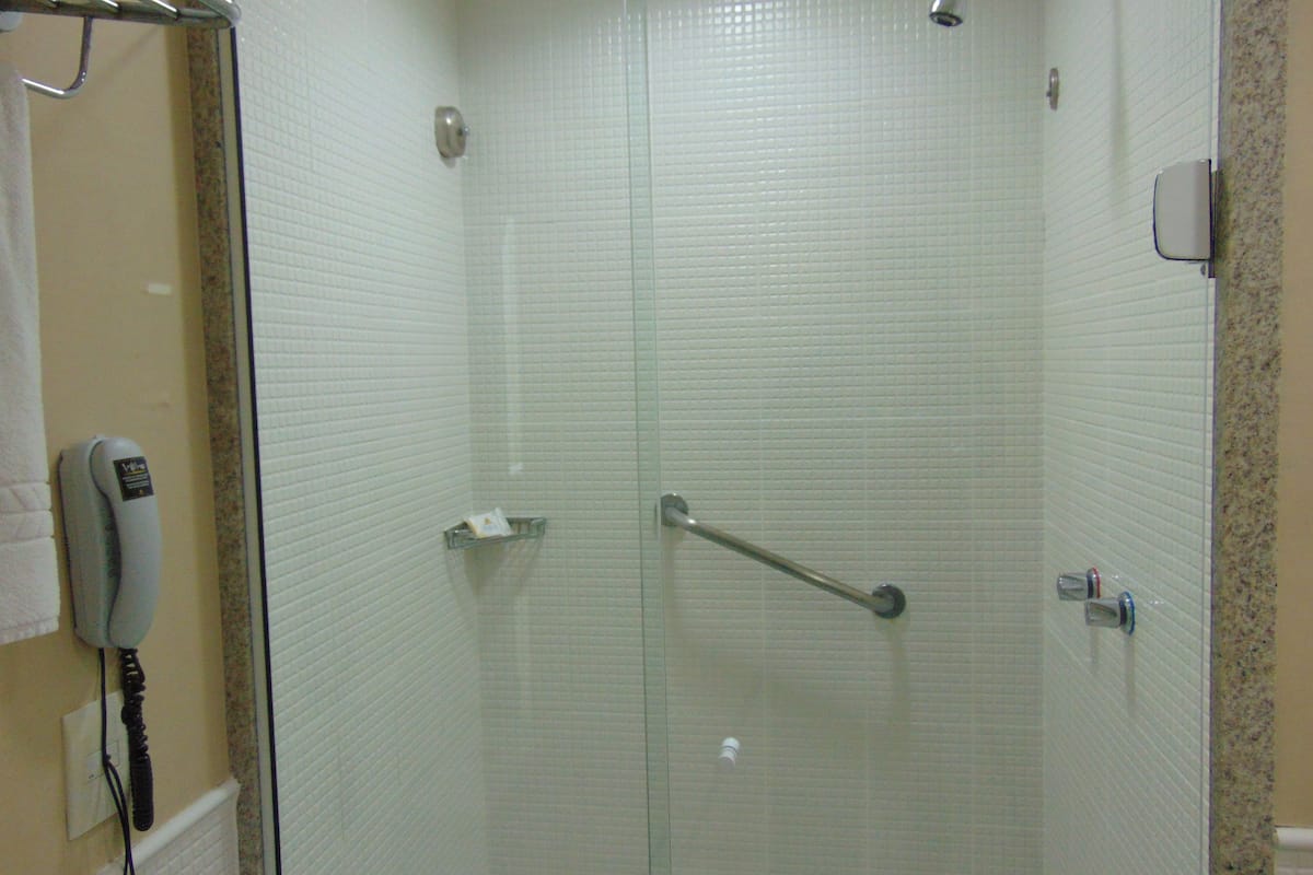 shower, eco-friendly toiletries, hair dryer, towels