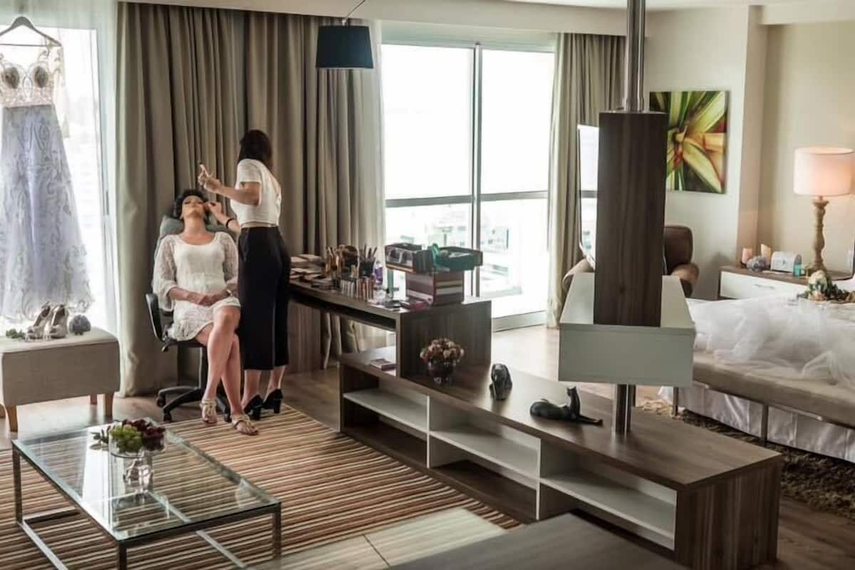 Suite, 1 King Bed, Partial Sea View | Minibar, in-room safe, blackout drapes, soundproofing