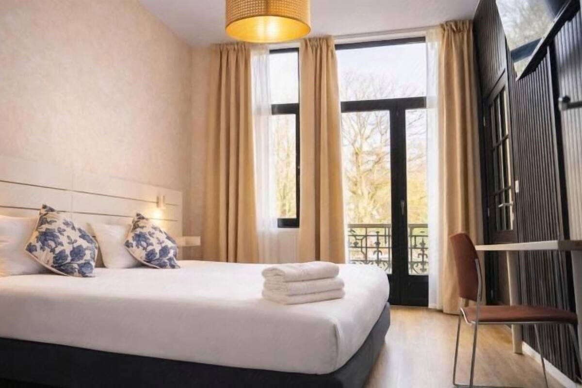 Pillow-top beds, desk, iron/ironing board (on request)