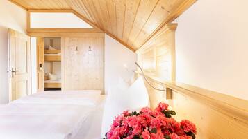 Hypo-allergenic bedding, down comforters, minibar, in-room safe